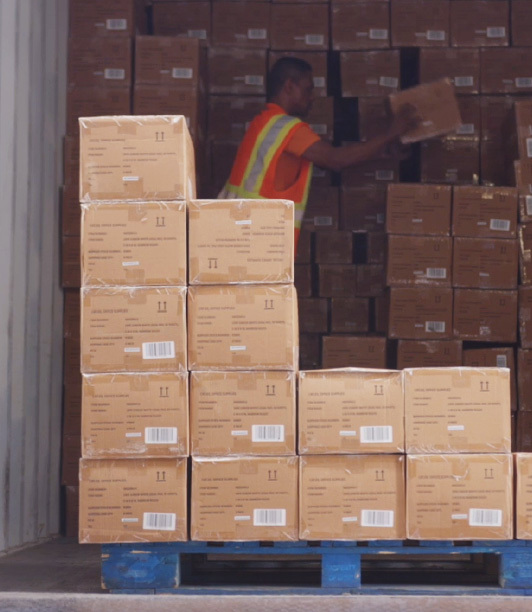 Boxed being loaded on a box truck