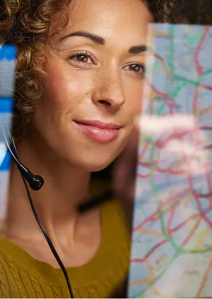 Legacy worker looking at map on computer