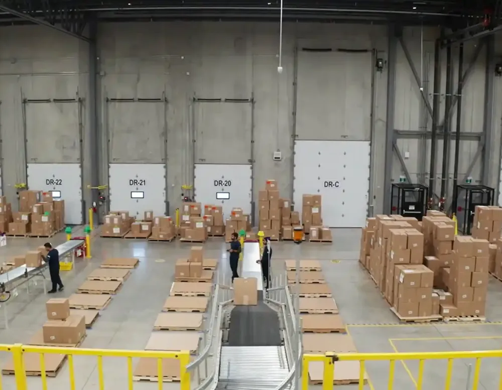 The floor of a warehouse with boxes.