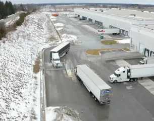 Domain yard aerial view with legacy warehouse